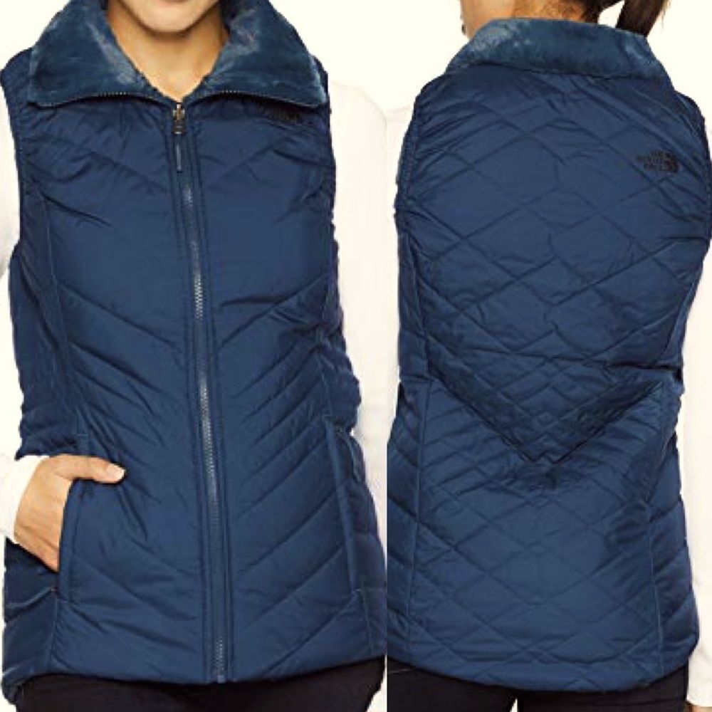 The North Face Women's Mossbud Insulated Revesible furry Vest Blue Wing Teal -S
